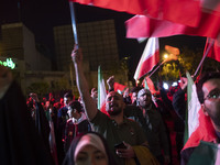 Iranians are waving Iranian flags as they celebrate Iran's IRGC UAV and missile attack against Israel in downtown Tehran, Iran, on April 14,...