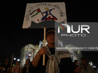 A person is demonstrating outside the Palace of Fine Arts in Mexico City, Mexico, on October 7, 2023, amid the escalation in the Middle East...