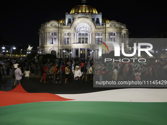 People are gathering at the Palace of Fine Arts in Mexico City, Mexico, on October 7, 2023, amid escalating tensions in the Middle East betw...