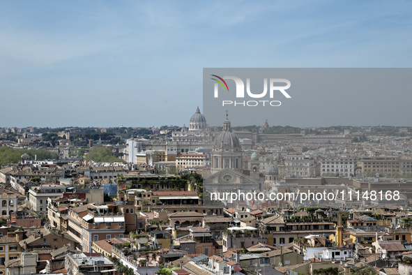 A general view of Rome is seen from Trinita dei Monti, with St. Peter's dome in the center. 