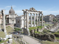 A general view is being shown of (L-R) the church of Santi Luca e Martina, the Arch of Septimius Severus, the ruins of the Temple of Saturn,...