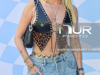 Maeve Reilly arrives at the 7th Annual REVOLVE Festival 2024 during the 2024 Coachella Valley Music And Arts Festival - Weekend 1 - Day 2 he...