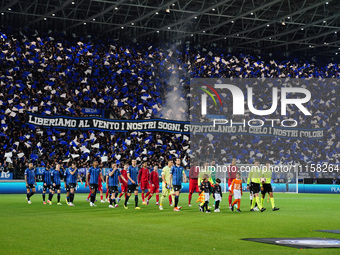 The players are entering the field for the UEFA Europa League quarter-finals second leg football match between Atalanta BC and Liverpool FC...