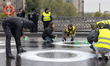 Members of the group Fridays For Future (FFF) are gathering on the Marschallbrucke bridge...