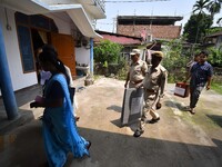Polling officials are arriving at a home to collect postal ballots, cast by senior citizens and disabled voters from their homes for the Lok...