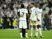 Vinicius Junior left winger of Real Madrid and Brazil, Jude Bellingham central midfield of Real Madrid and England and Carlo Ancelotti head...