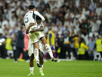 Vinicius Junior left winger of Real Madrid and Brazil and Jude Bellingham central midfield of Real Madrid and England celebrates victory aft...