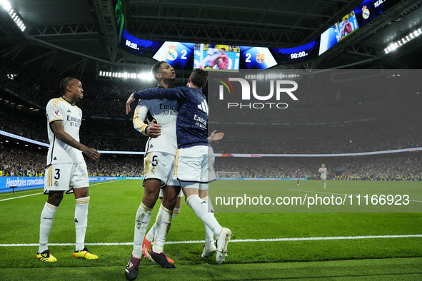Jude Bellingham central midfield of Real Madrid and England celebrates after scoring his sides first goal during the UEFA Women's Champions...