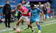 Pedro (R) of Zenit St. Petersburg and Maksim Sidorov of Orenburg vie for the ball during t...