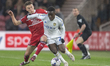 Wilfried Gnonto of Leeds United is challenging for the ball with Luke Thomas of Middlesbro...