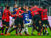 Players are fighting during the AC Milan versus FC Internazionale Serie A match at Giuseppe Meazza Stadium in Milan, Italy, on April 22, 202...