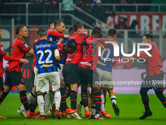 Players are fighting during the AC Milan versus FC Internazionale Serie A match at Giuseppe Meazza Stadium in Milan, Italy, on April 22, 202...
