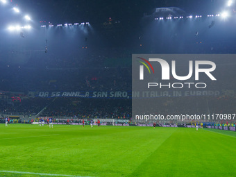 The atmosphere is electric at the San Siro Stadium during the match between AC Milan and FC Internazionale for Serie A at Giuseppe Meazza St...