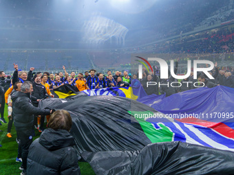 The FC Inter team is celebrating their championship during the match against AC Milan in the Serie A at Giuseppe Meazza Stadium in Milan, It...