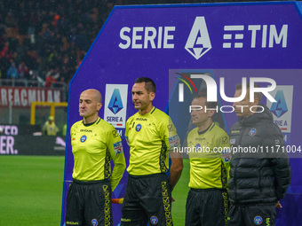 Referee Andrea Colombo is officiating the match between AC Milan and FC Internazionale in the Serie A at Giuseppe Meazza Stadium on April 22...