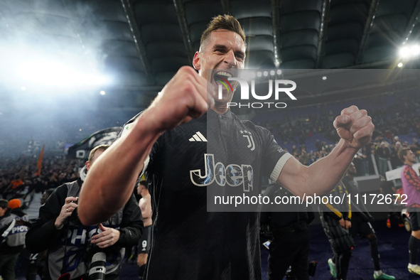 Arkadiusz Milik of Juventus FC is celebrating the victory of the Coppa Italia Semi-final Second Leg match between SS Lazio and Juventus FC a...