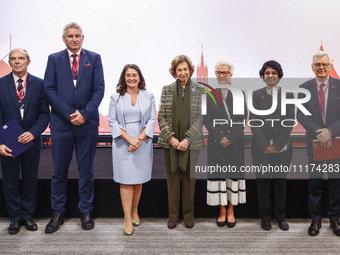 Queen Sofia of Spain, HRH Princess Muna Al Hussein of Jordan, Paola Barbarino, Wojciech Konieczny and Zbigniew Tomczak pose for a family pho...