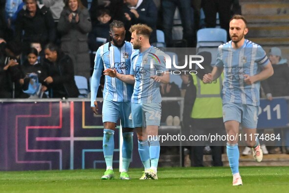 Kasey Palmer, wearing number 45 for Coventry City, is celebrating after scoring his team's first goal during the Sky Bet Championship match...