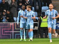 Kasey Palmer, wearing number 45 for Coventry City, is celebrating after scoring his team's first goal during the Sky Bet Championship match...