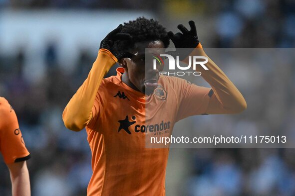 Jaden Philogene (23, Hull City) is celebrating after scoring his team's first goal in front of the Coventry fans during the Sky Bet Champion...