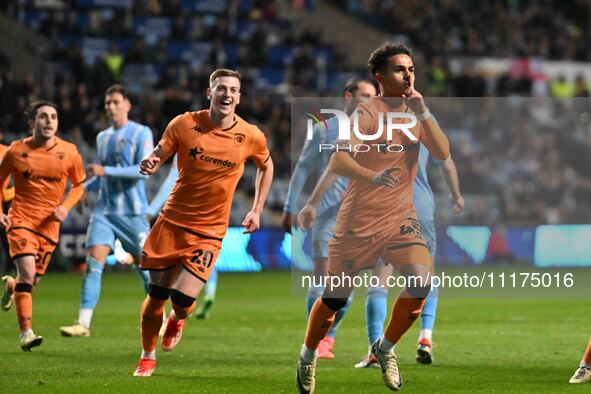 Fabio Carvalho of Hull City is celebrating after scoring his team's second goal from the penalty spot during the Sky Bet Championship match...