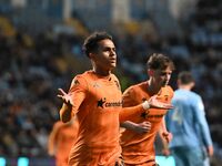 Fabio Carvalho of Hull City is celebrating after scoring his team's second goal during the Sky Bet Championship match between Coventry City...