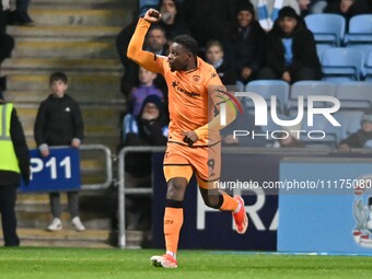 Noah Ohio of Hull City is celebrating after scoring his team's third goal during the Sky Bet Championship match between Coventry City and Hu...