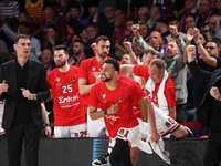 Greek players are celebrating during the match between FC Barcelona and Olympiacos Piraeus for the first game of the Play-off of the Turkish...