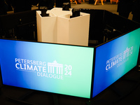 Signs are being displayed at the Petersberg Climate Dialogue 2024 in Berlin, Germany, on April 25, 2024. (