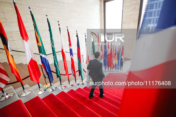 A visitor is leaving the Petersberg Climate Dialogue in Berlin, Germany, on April 25, 2024. 