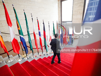 A visitor is leaving the Petersberg Climate Dialogue in Berlin, Germany, on April 25, 2024. (