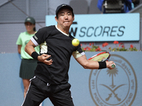 Yoshihito Nishioka of Japan is in action during the 2024 ATP Tour Madrid Open tennis tournament at Caja Magica in Madrid, Spain, on April 25...