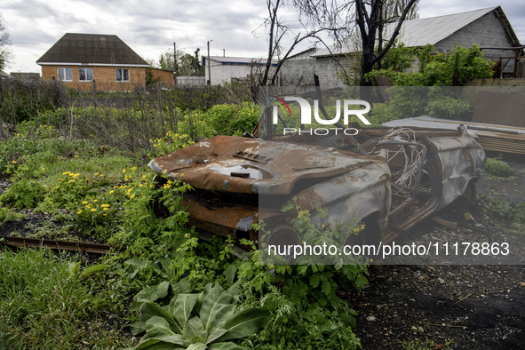 A civilian car is destroyed at the beginning of Russia's invasion of Ukraine in a village in the Kyiv region, Ukraine, on April 25, 2024. 