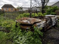 A civilian car is destroyed at the beginning of Russia's invasion of Ukraine in a village in the Kyiv region, Ukraine, on April 25, 2024. (