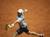 Facundo Bagnis of Argentina is in action during the 2024 ATP Tour Madrid Open tennis tournament at Caja Magica in Madrid, Spain, on April 26...