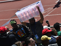 Spectators are watching athletes compete on day 2 of the 128th Penn Relays Carnival, the largest track and field meet in the USA, at Frankli...