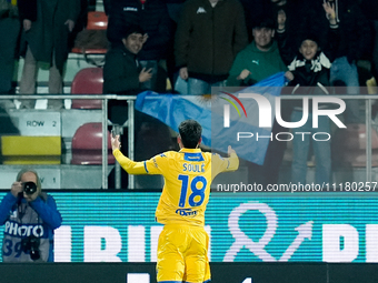 Matias Soule' of Frosinone Calcio celebrates after scoring first goal as an Argentine flag waves behind him during the Serie A TIM match bet...