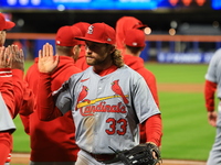 The St. Louis Cardinals are celebrating a 4-2 win in the baseball game against the New York Mets at Citi Field in New York City, N.Y., on Ap...