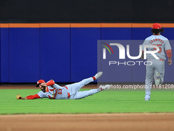 St. Louis Cardinals outfielder Michael Siani #63 is making a catch during the sixth inning of a baseball game against the New York Mets at C...