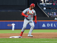 Alec Burleson #41 of the St. Louis Cardinals is rounding the bases after hitting a three-run homer during the second inning of a baseball ga...