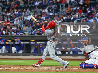 Alec Burleson #41 of the St. Louis Cardinals is hitting a three-run homer during the second inning of a baseball game against the New York M...