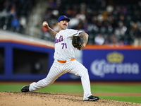 New York Mets pitcher Sean Reid-Foley #71 is throwing during the ninth inning of the baseball game against the St. Louis Cardinals at Citi F...