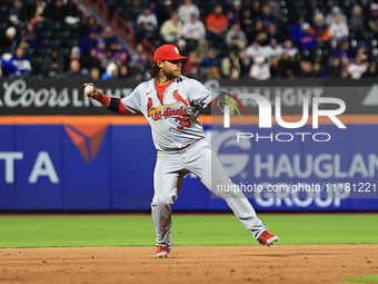 St. Louis Cardinals shortstop Brandon Crawford #35 is batting during the fifth inning of a baseball game against the New York Mets at Citi F...