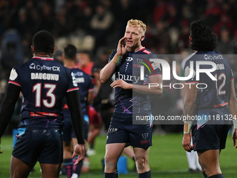 Carter Gordon of the Rebels is talking to a teammate during the round ten Super Rugby match between the Crusaders and the Melbourne Rebels a...
