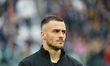 Filip Kostic is playing for FC Juventus against AC Milan in a Serie A match at Allianz Sta...