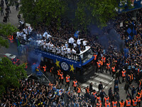Inter FC players are celebrating their victory with fans during their bus parade, making a stop to celebrate on stage at the San Siro Stadiu...