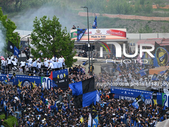 Inter FC players are celebrating their victory with fans during their bus parade, making a stop to celebrate on stage at the San Siro Stadiu...