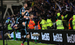 Jamie Vardy of Leicester City celebrates with teammates after scoring the teams second goa...