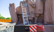 Workers are dismantling the monument commemorating the Pereiaslav Agreement under the Arch...