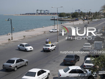 A coastal street and a wharf are seen in Bushehr, Iran's first nuclear seaport city, located in Bushehr province on the northern coast of th...